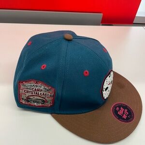 It’s a straight brim Friday the 13th hat